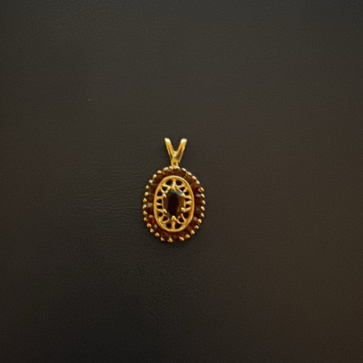 10k Gold and Garnet Scrollwork Pendant Only