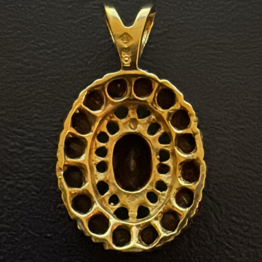 10k Gold and Garnet Scrollwork Pendant Only