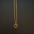 10k Gold and Garnet Scrollwork Pendant Only